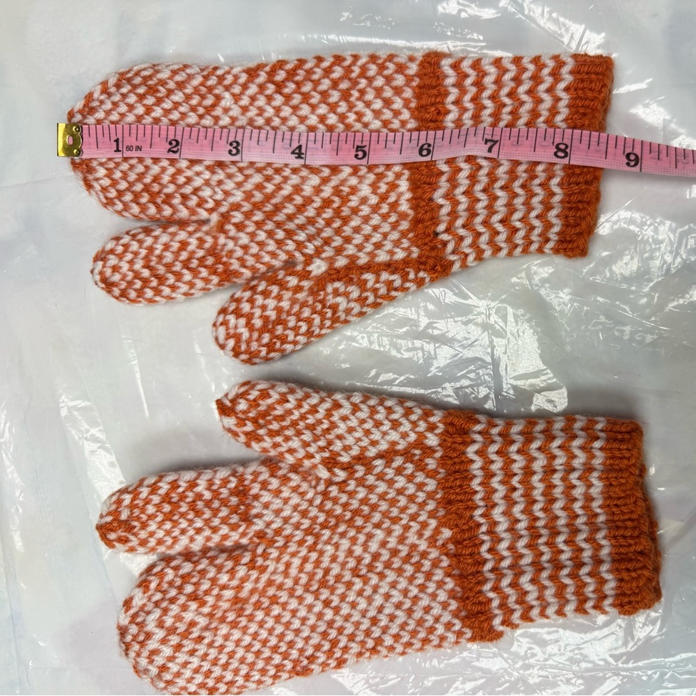 Home Made by my mom. 
Orange and White Knit Gloves